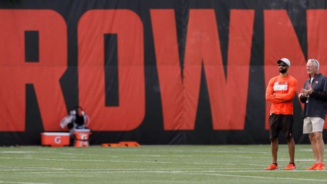 Cleveland Browns General Manager Andrew Berry, left, and owner Jimmy Haslam observe from the sideline during an NFL football practice at the team's training facility, Tuesday, June 15, 2021, in Berea, Ohio. Browns 8